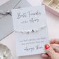 Delicate silver bracelet with star charms, displayed on a card that reads: ‘Best Friends are like Stars, you don’t always see them but you know they are always there’