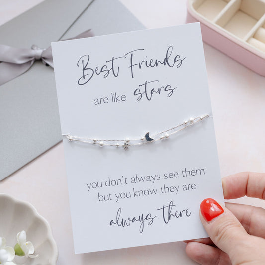 Delicate silver bracelet with star charms, displayed on a card that reads: ‘Best Friends are like Stars, you don’t always see them but you know they are always there’