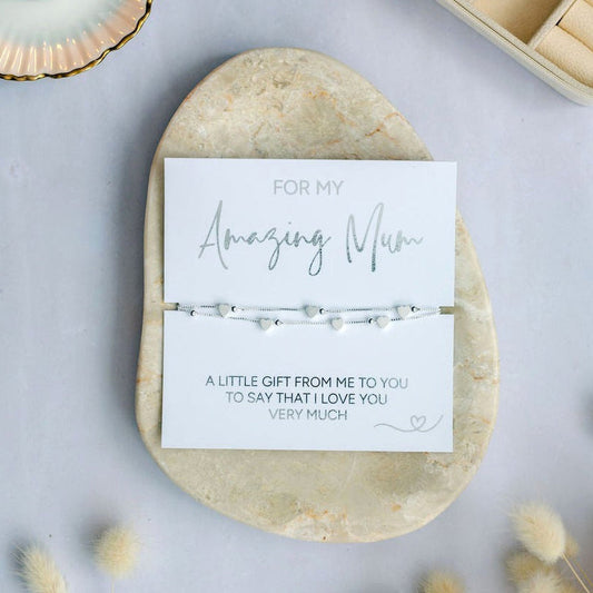 Beautiful minimalist bracelet with heart charm and ‘Amazing Mum’ wording on gift card. Perfect thoughtful present for Mother’s Day, birthdays or a sentimental surprise to show your Mum how loved she is.